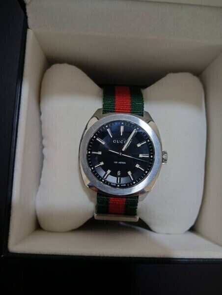 นาฬิกา Gucci หน้าปัดดำ สายผ้าแถบเขียวแดงพร้อมกล่อง Money2Plus.com รับจำนำนาฬิกา รับซื้อให้ราคาสูง ปลอดภัย ใกล้พระราม3